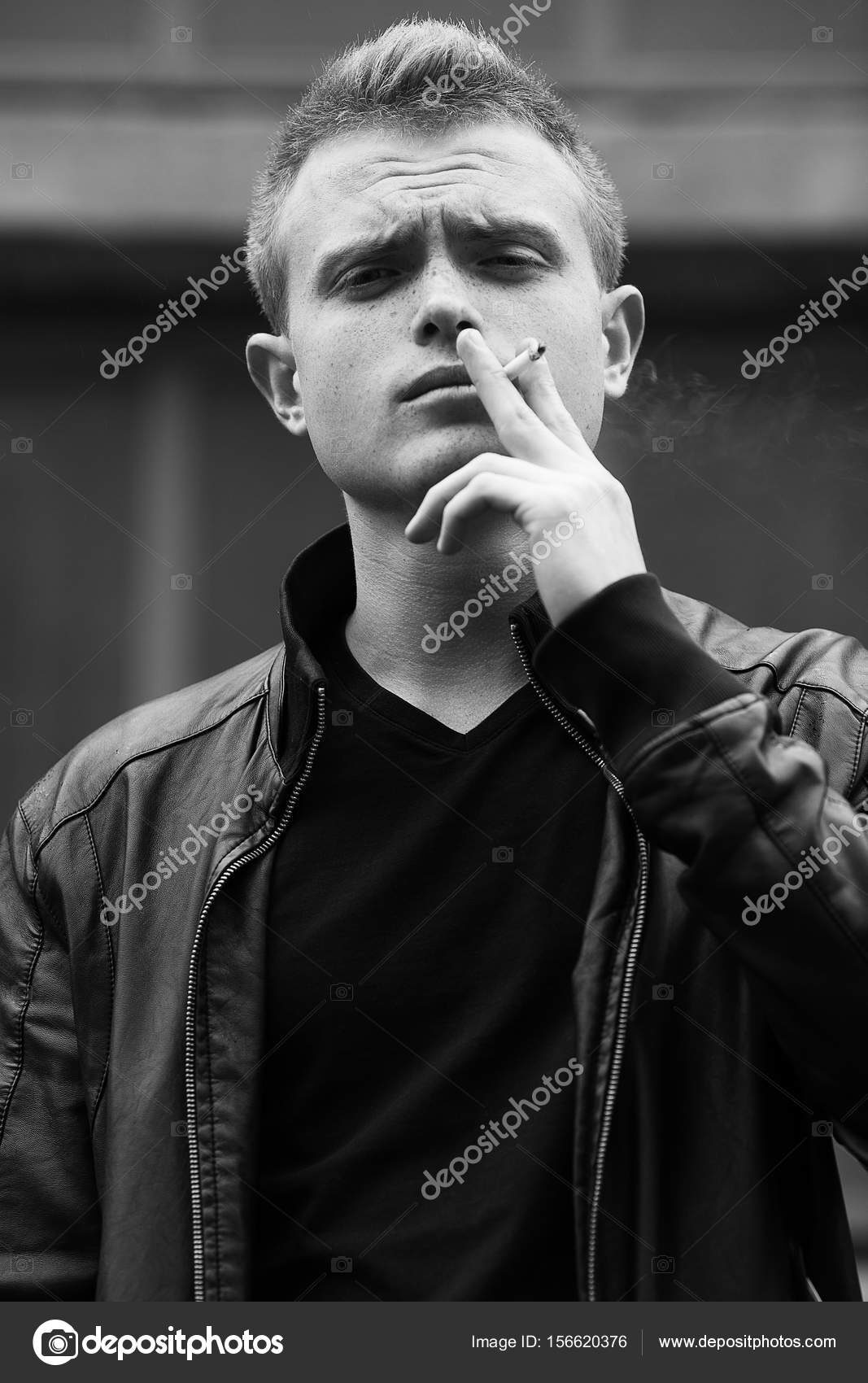 bad-boy-concept-portrait-of-brutal-young-man-with-short-hair-we